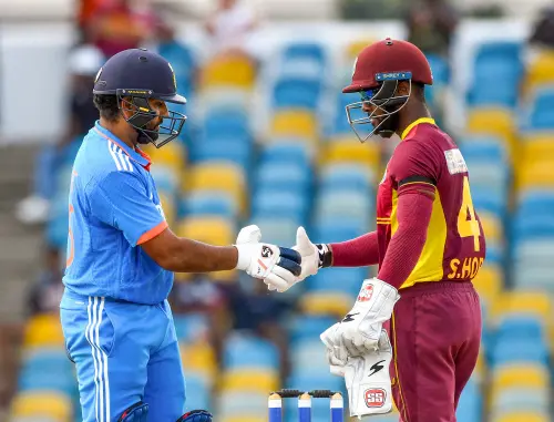 Bridgetown, July 28 (ANI): India's skipper Rohit Sharma shakes hands with West Indies skipper Shai Hope as India won the 1st ODI match by 5 wickets, at Kensington Oval in Bridgetown on Thursday. (ANI Photo)