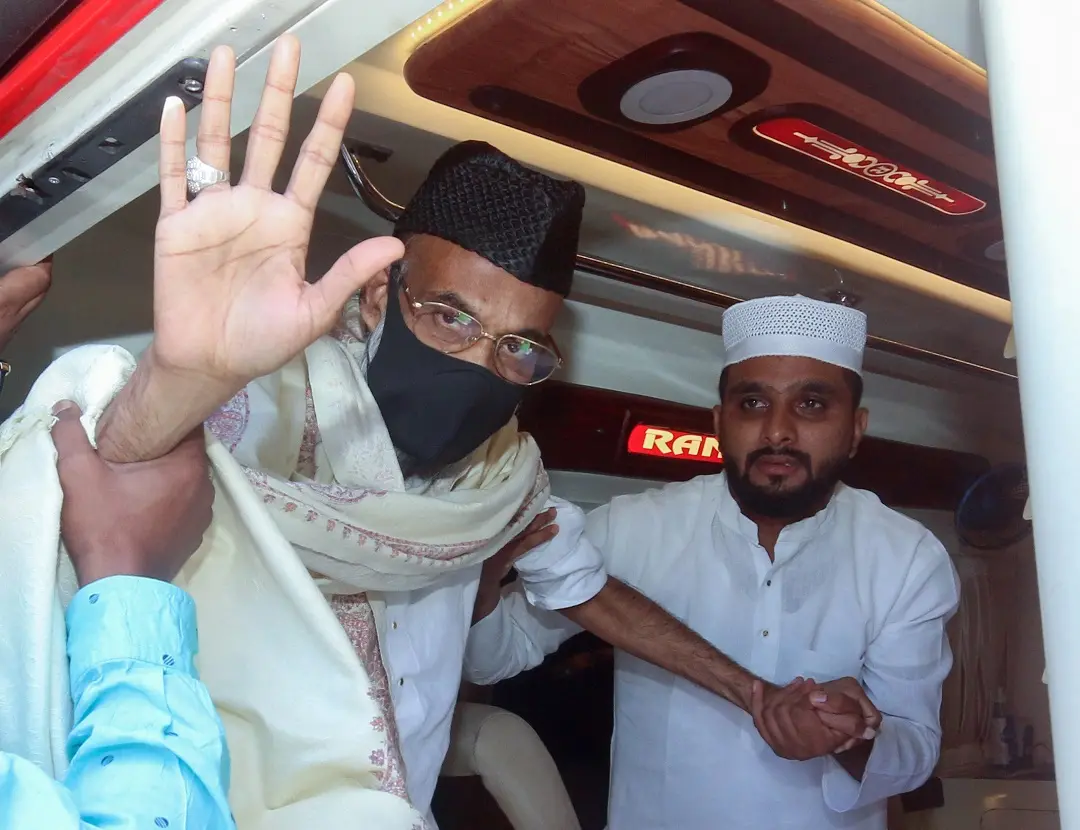 People's Democratic Party (PDP) chairman and 2008 Bengaluru serial blasts case prime accused Abdul Nasar Madani waves as he arrives at Thiruvananthapuram International Airport | Photo: ANI