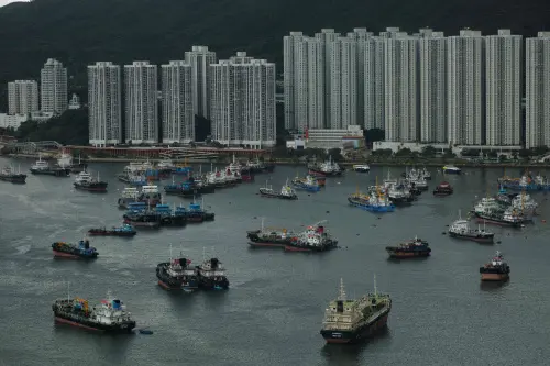 Boats are parked at a typhoon shelter in Tseun Wan as a precaution for the approaching Typhoon Talim in Hong Kong on July 16, 2023. Photo: AFP