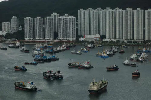 People evacuated as typhoon nears southern China, Vietnam