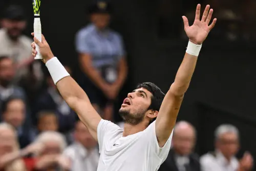 Spain's Carlos Alcaraz celebrates winning against Russia's Daniil Medvedev during their men's singles semi-finals tennis match on the twelfth day of the 2023 Wimbledon Championships at The All England Lawn Tennis Club in Wimbledon, southwest London, on July 14, 2023 | Photo: AFP