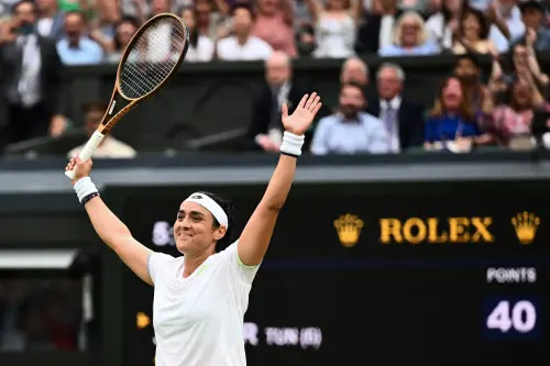 Tunisia's Ons Jabeur celebrates winning against Belarus's Aryna Sabalenka during their women's singles semi-finals tennis match on the eleventh day of the 2023 Wimbledon Championships at The All England Lawn Tennis Club in Wimbledon, southwest London, on July 13, 2023. Photo: AFP