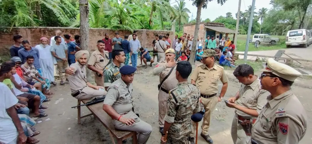 Police personnel at the polling booth as voters arrive to cast their votes during the repolling of Panchayat Elections | File Photo: ANI