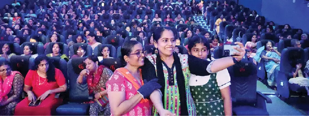 Girija (left) posing with supporters | Photo: Mathrubhumi Print