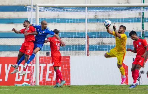 Goalkeeper of Bangladesh Anisur Rahman Zico (yellow) catches the ball during the SAFF Championship 2023 semi-final football match between Kuwait and Bangladesh, at Kanteerava Stadium in Bengaluru, Saturday, July 1, 2023 | Photo: PTI