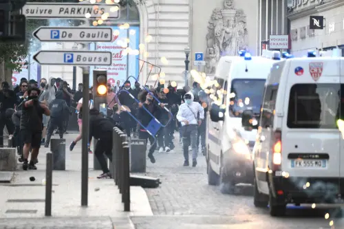 Protesters clash with CRS riot police in Marseille, southern France on June 30, 2023, over the shooting of a teenage driver by French police in a Paris suburb on June 27. The unrest has come in response to the killing of 17-year-old Nahel, whose death has revived longstanding grievances about policing and racial profiling in France's low-income and multi-ethnic suburbs. (Photo by CHRISTOPHE SIMON / AFP)