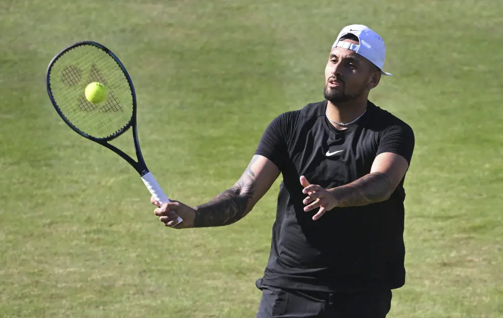 Wu Yibing returns the ball to Australia's Nick Kyrgios during the Stuttgart tennis tournament | AP