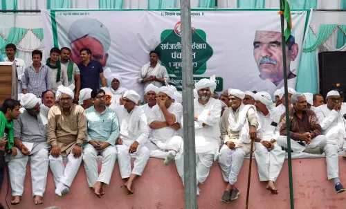 Bharatiya Kisan Union (BKU) President Naresh Tikait holds a 'Mahapanchayat' to discuss the wrestlers' ongoing protest against the alleged sexual harassment of women wrestlers by the Wrestling Federation of India (WFI) chief Brij Bhushan Sharan Singh, at Shaoram Village, in Muzaffarnagar on Thursday | Photo: ANI