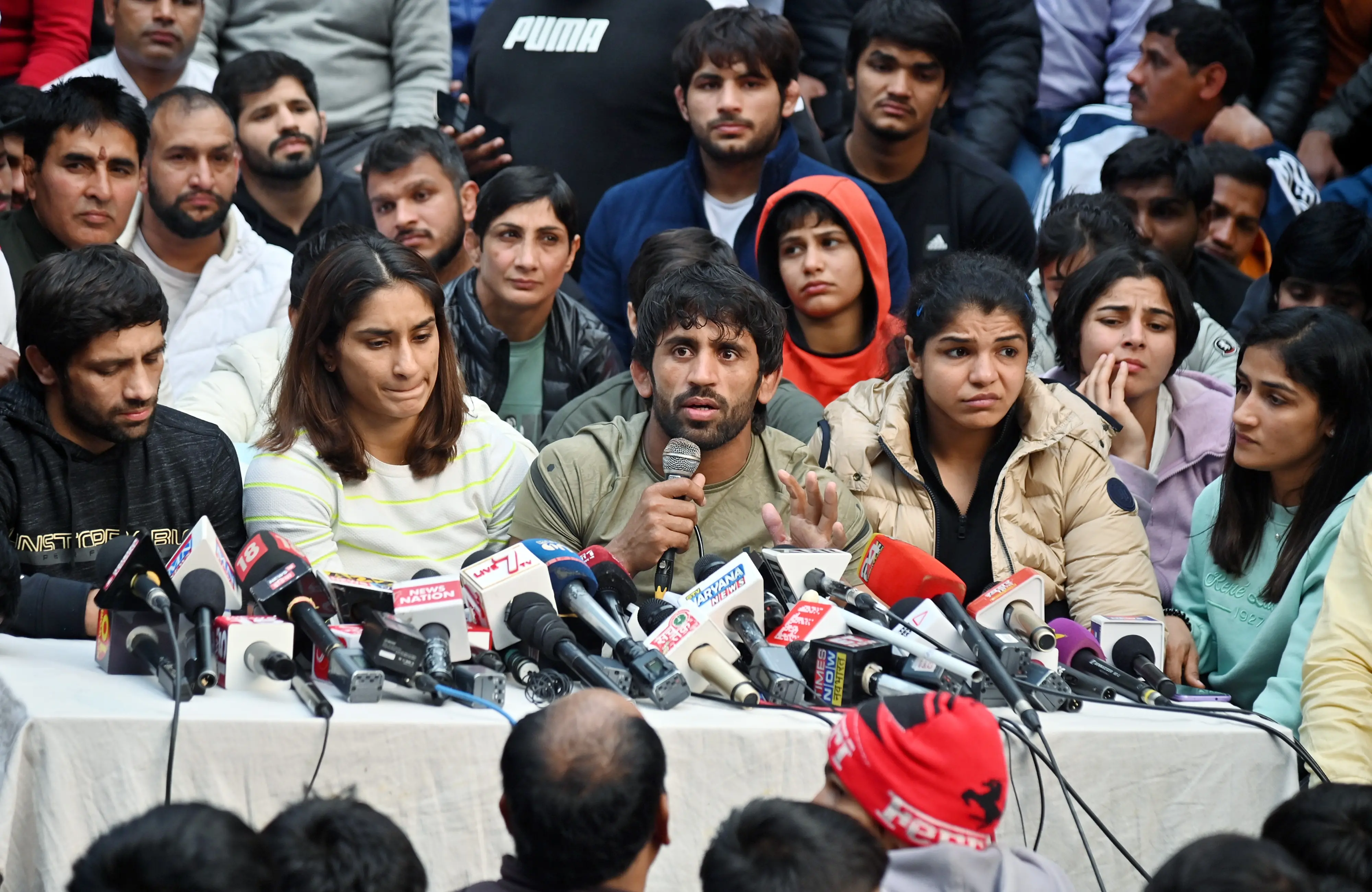 Wrestlers Vinesh Phogat, Sakshee Malikkh, Bajrang Punia, and others address a press conference on Thursday | Photo: ANI