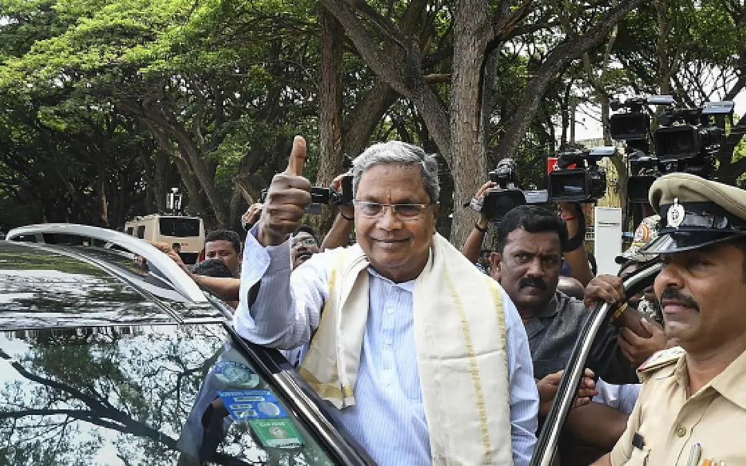 Congress leader Siddaramaiah reacts as the party leads in Assembly polls in the early trends on the vote counting day, in Mysuru, Saturday, May 13, 2023 | Photo: PTI