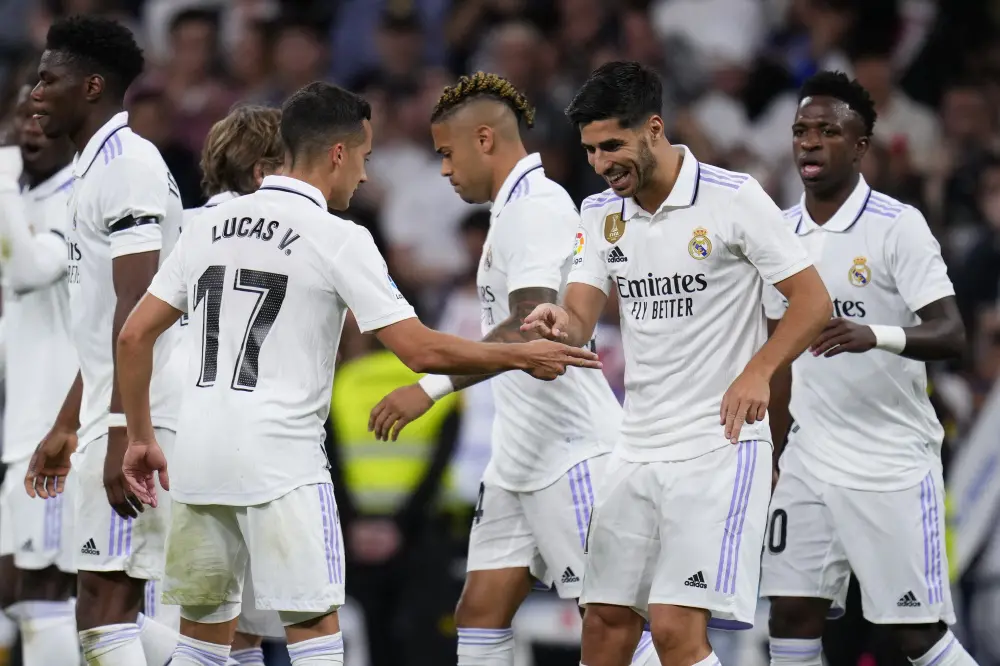 Real Madrid players celebrate after scoring | Photo: AP