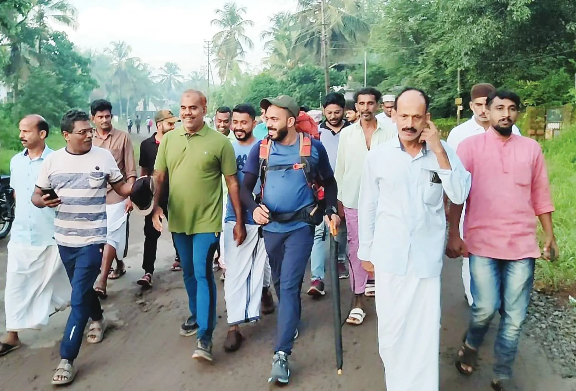 Shihab with family and friends as he set off on the journey from his home