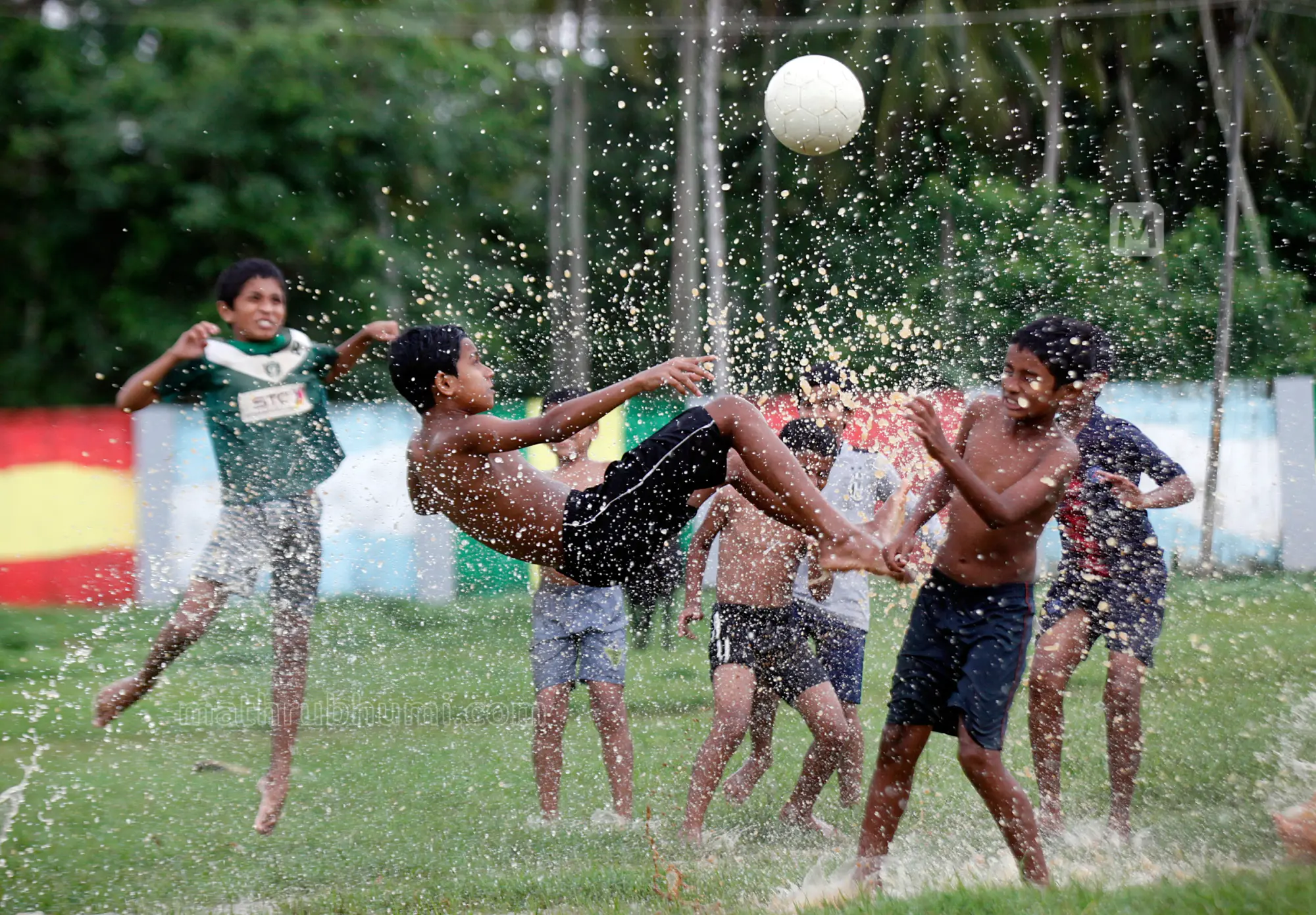 Monsoon football, Malappuram | Photo: Mathrubhumi/Satheesh Kumar KB