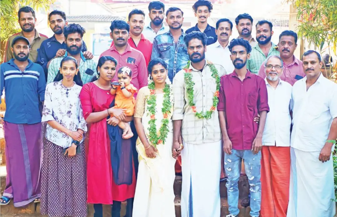 Arya, Biju with their friends and local residents at Sree Krishna Temple in Peravoor | Photo: Mathrubhumi