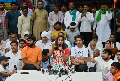 Wrestlers Bajrang Punia, Vinesh Phogat and Sakshi Malik address the media | ANI