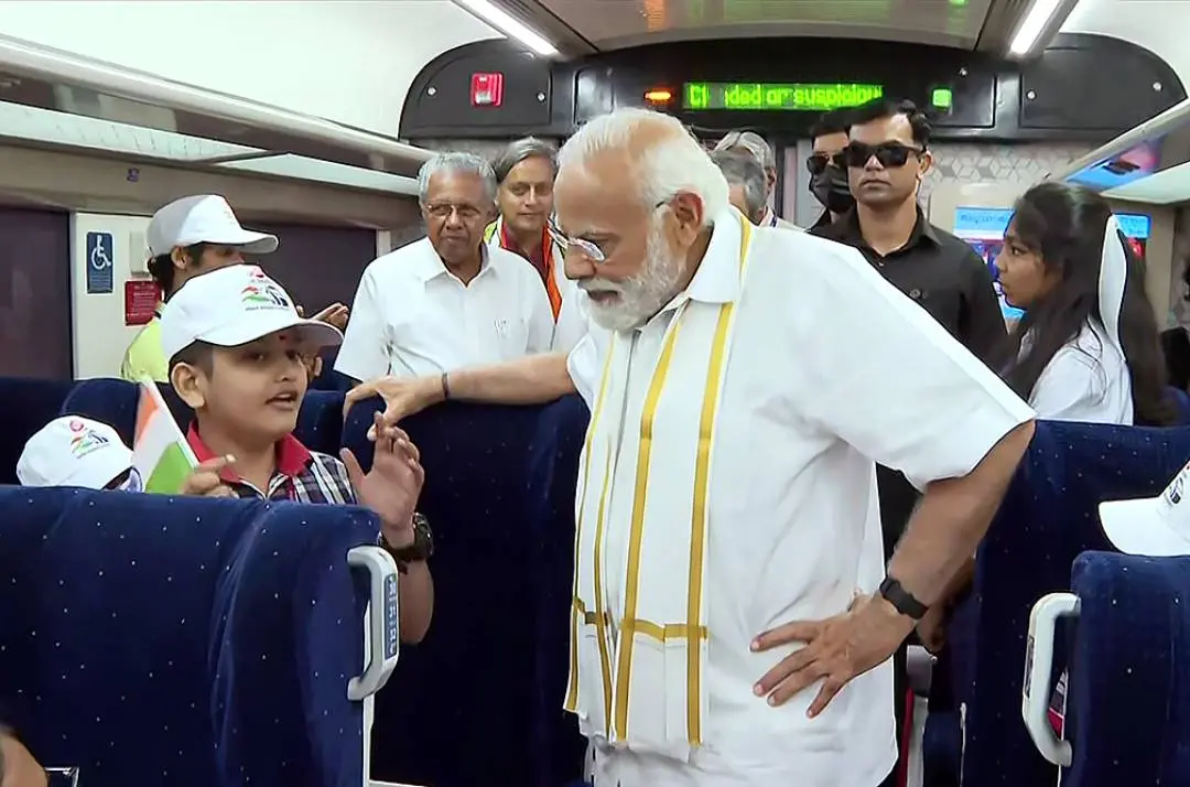 Prime Minister Narendra interacts with students on board the Vande Bharat Express train after flagging off from Thiruvananthapuram Central railway station | Photo: ANI