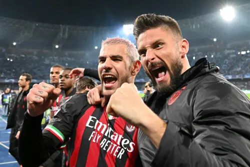 Theo Hernandez (L) and AC Milan's French forward Olivier Giroud celebrate at the end of the match | AFP