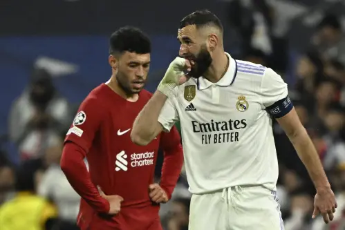 Benzema guides Madrid past Liverpool to reach Champions League quarters