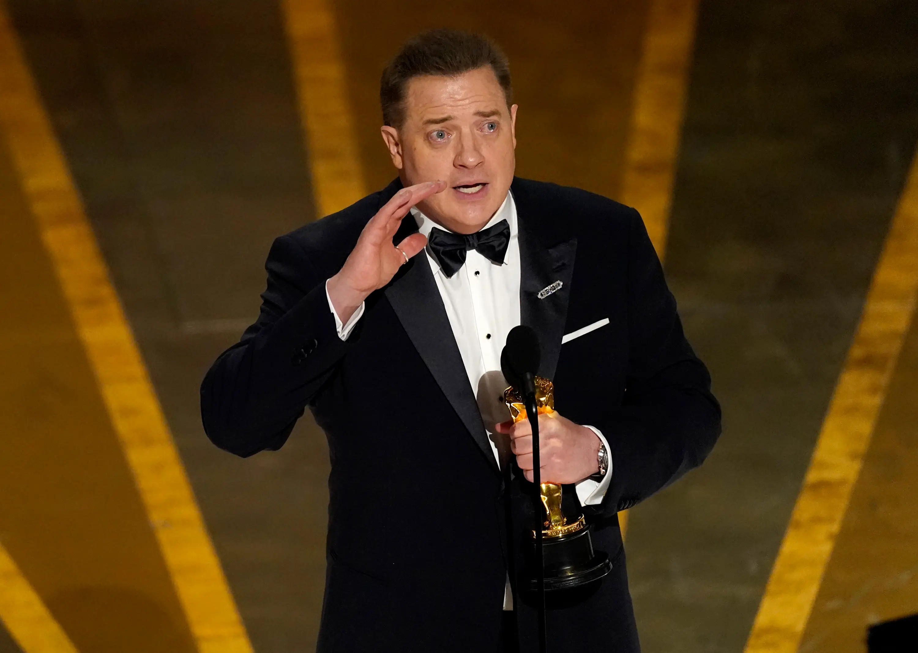 Brendan Fraser accepts the award for best performance by an actor in a leading role for 'The Whale' at the Oscars | Photo: AP