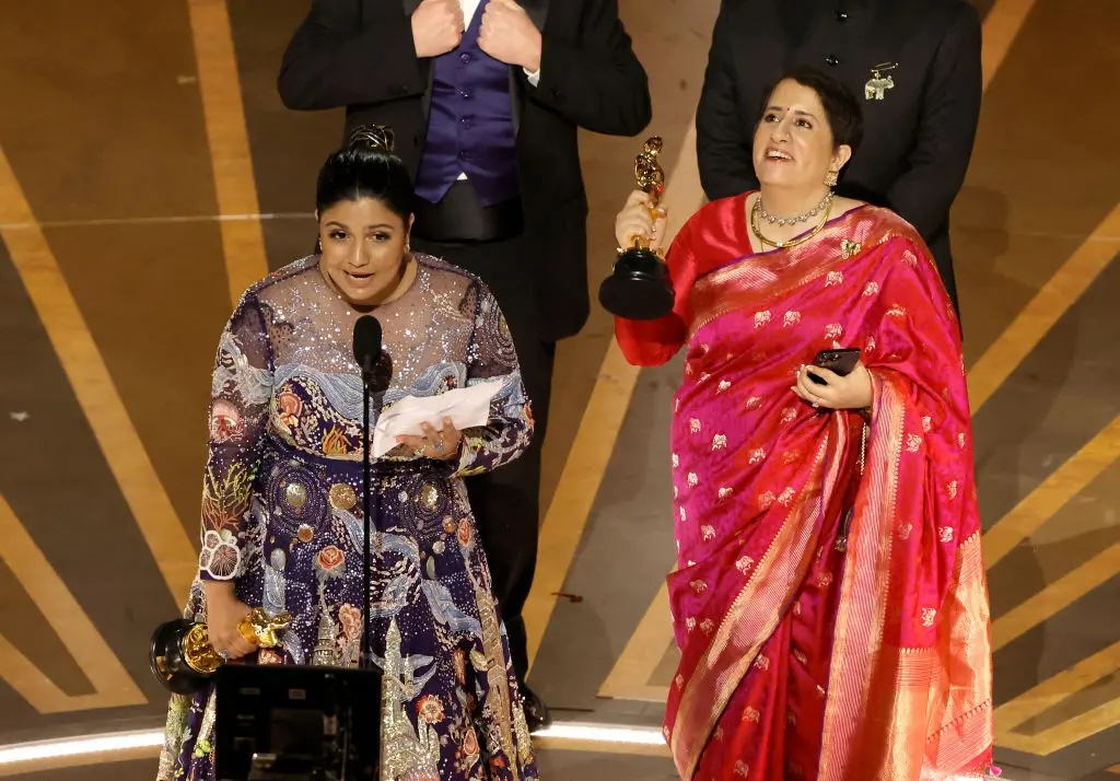 Kartiki Gonsalves and Guneet Monga accept the Best Documentary Short Subject award for "The Elephant Whisperers"  | Getty Images