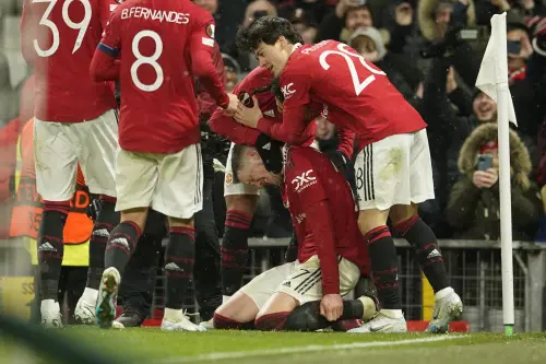 Wout Weghorst, centre, celebrates after scoring his side's fourth goal | AP