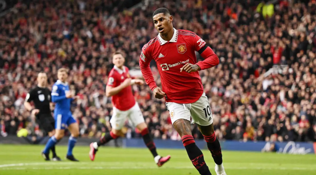 Manchester United's English striker Marcus Rashford celebrates scoring the opening goal during the English Premier League football match between Manchester United and Leicester City at Old Trafford in Manchester, north west England, on February 19, 2023 | Photo: AFP