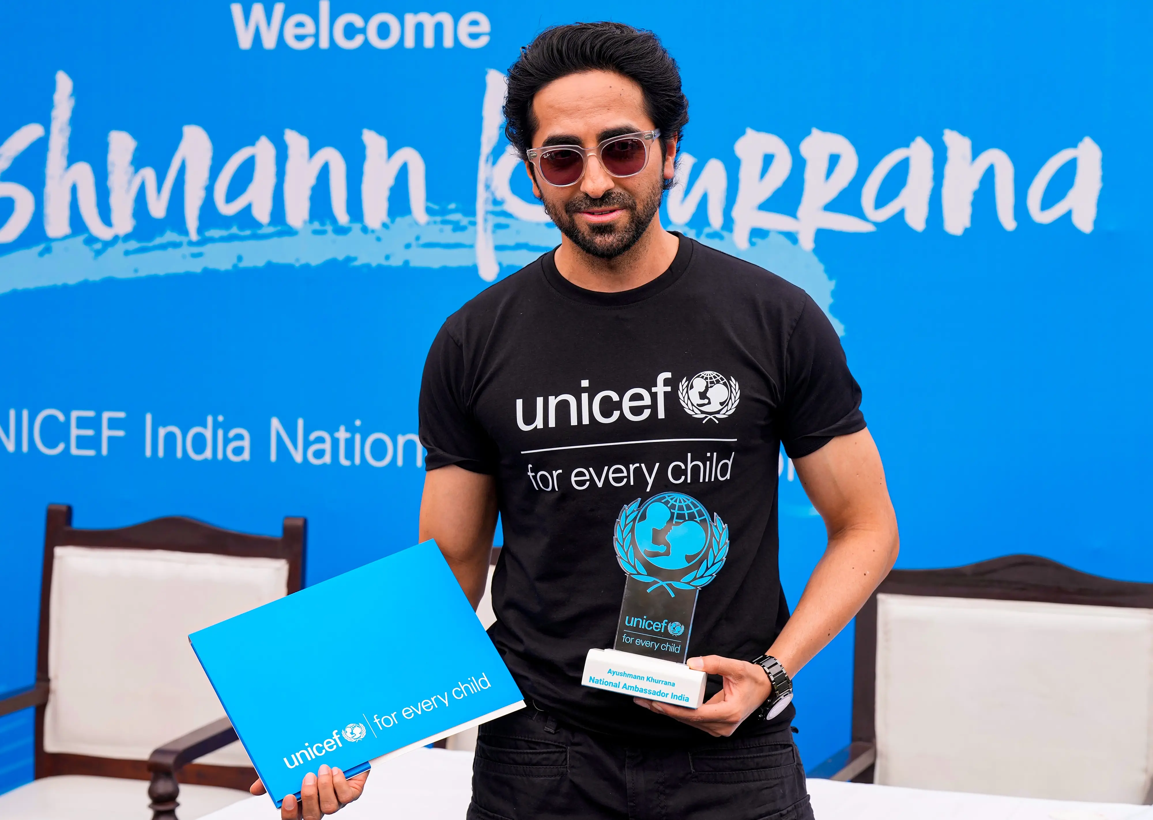 Actor Ayushmann Khurrana poses with a memento as he is named as National Ambassador of UNICEF India | Photo: PTI