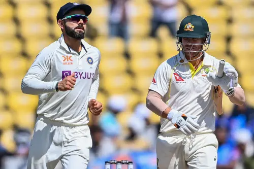 Virat Kohli, Australia's David Warner | Photo: AFP