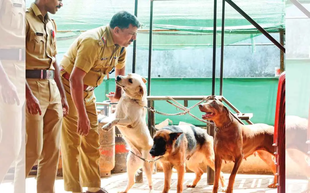 Bruno, Bruni and Rani with cops in Ernakulam district jail l Photo: B Muraleekrishnan/ Mathrubhumi