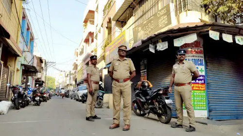 Security personnel stand guard during NIA searches in Coimbatore | PTI
