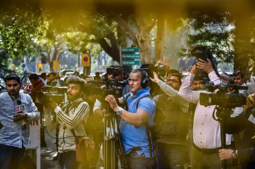 Media personnel outside the BBC office amid a survey operation conducted by Income Tax Department officials as part of a tax evasion investigation, at KG Marg in New Delhi, Tuesday, Feb. 14, 2023 | Photo: PTI