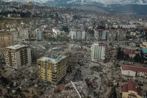 This aerial view shows collapsed buildings in Turkey | AFP