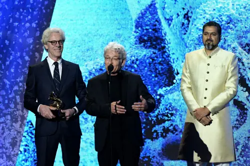 US drummer and composer Stewart Copeland, record producer Herbert Waltl, and Indian composer Ricky Kej accept the award for Best Immersive Audio Album during the pre-telecast show of the 65th Annual Grammy Awards at the Crypto.com Arena in Los Angeles on February 5, 2023 | Photo: AFP