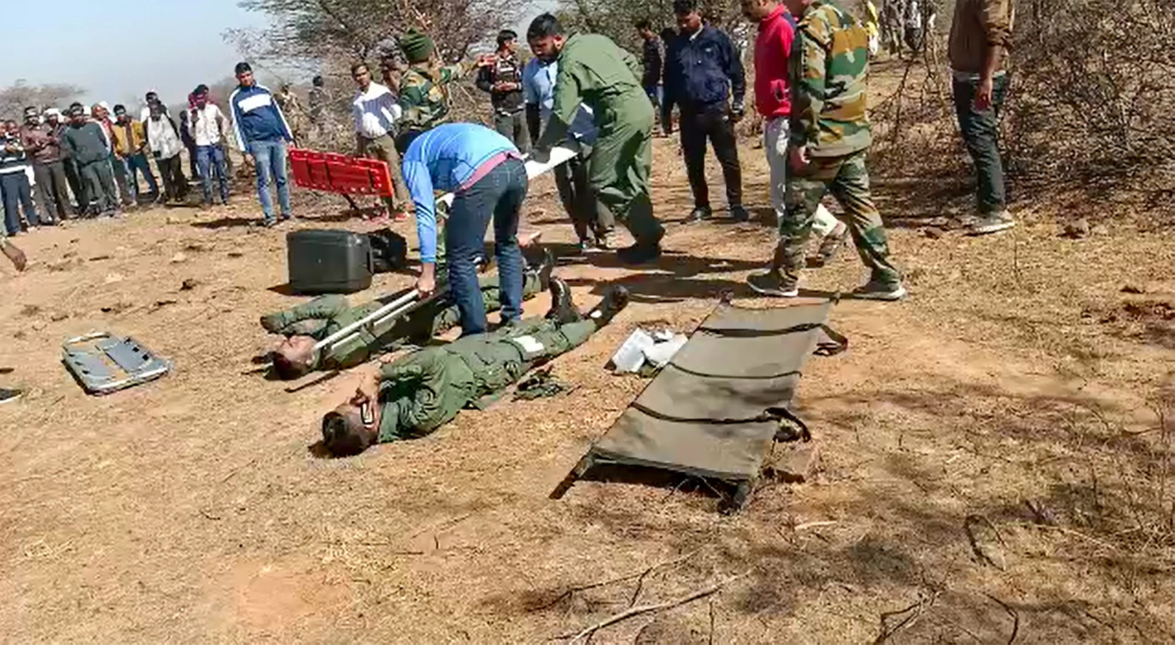 Pilots being rescued from the crash site | Photo: PTI
