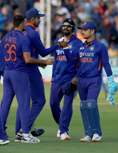 Deepak Hooda (2L) congratulates India's Ishan Kishan (R) | AFP