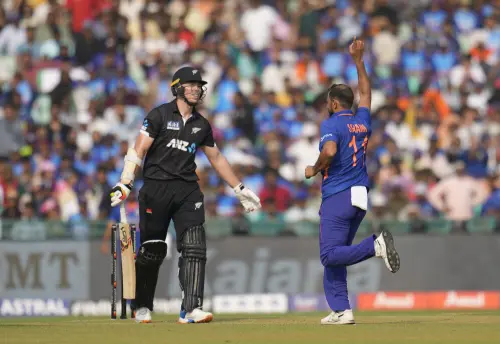 Mohammed Shami, right, celebrates the wicket of New Zealand's Michael Bracewell | AP