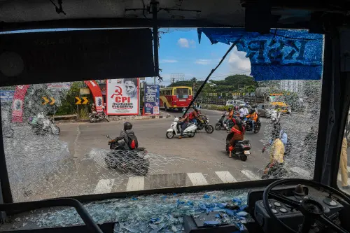 Broken windshield of a KSRTC bus after some miscreants threw stones on it, during the 'hartal' called by PFI on Sept 23, 2022 | Photo: PTI