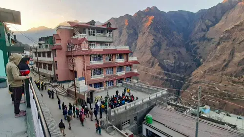 Locals protest against the government's decision to demolish the hotels after cracks appeared at the landslide affected area of Joshimath, in Chamoli district, Tuesday, Jan. 10, 2023 | Photo: PTI