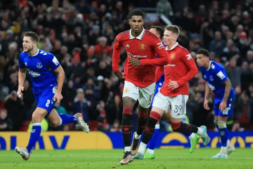 Manchester United's English striker Marcus Rashford (C) celebrates after scoring their third goal from the penalty spot during the English FA Cup third round football match between Manchester United and Everton at Old Trafford in Manchester, north west England, on January 6, 2023. - Man Utd won the game 3-1 | Photo: AFP