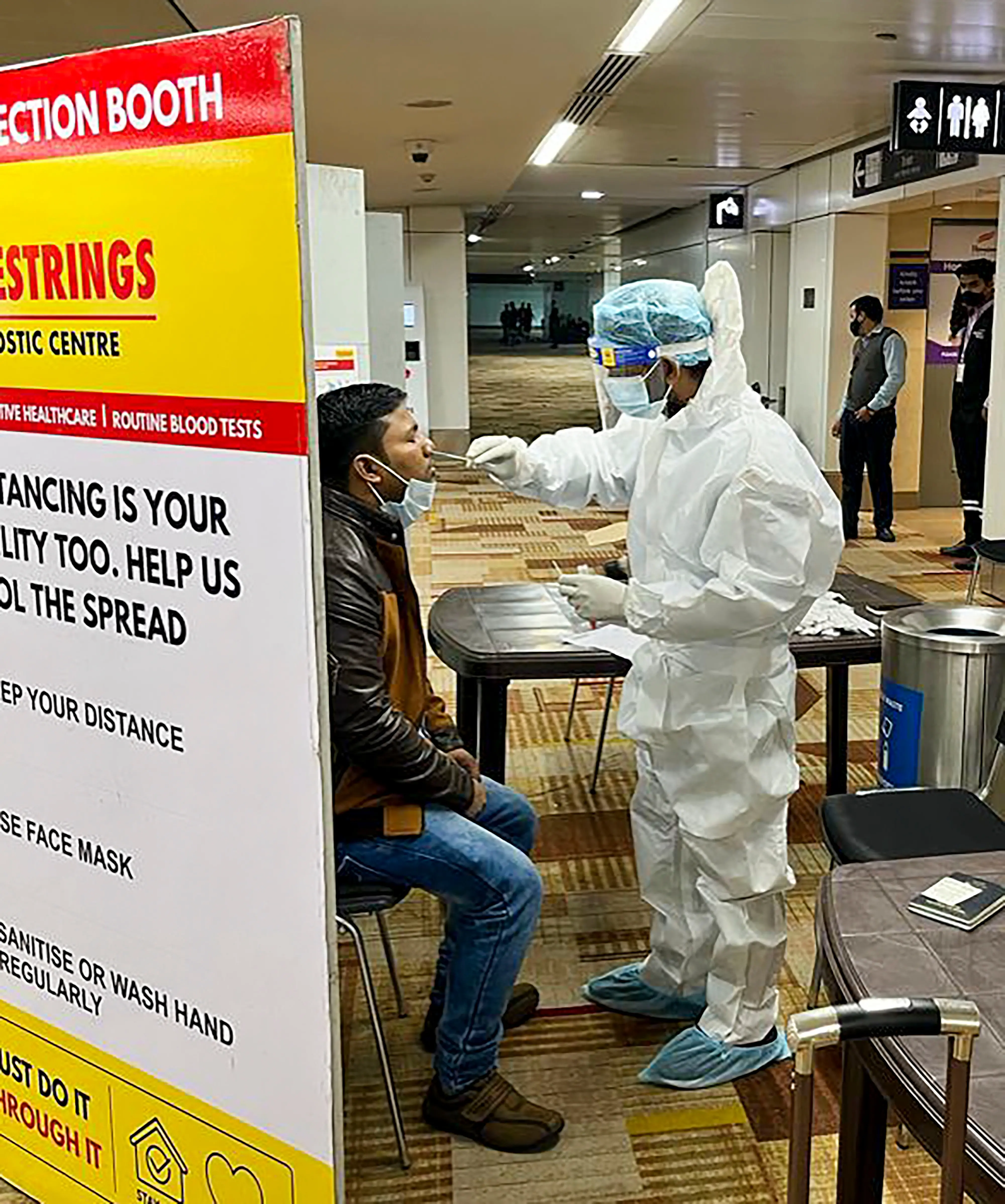 COVID test at Delhi airport. Photo: PTI
