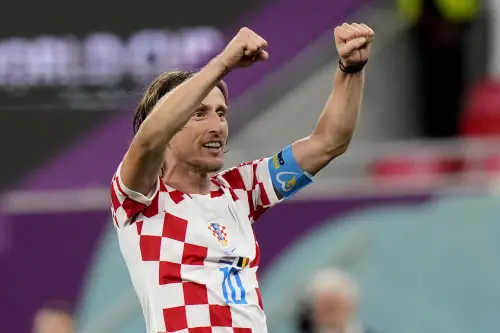 Luka Modric gestures towards the supporters | AP