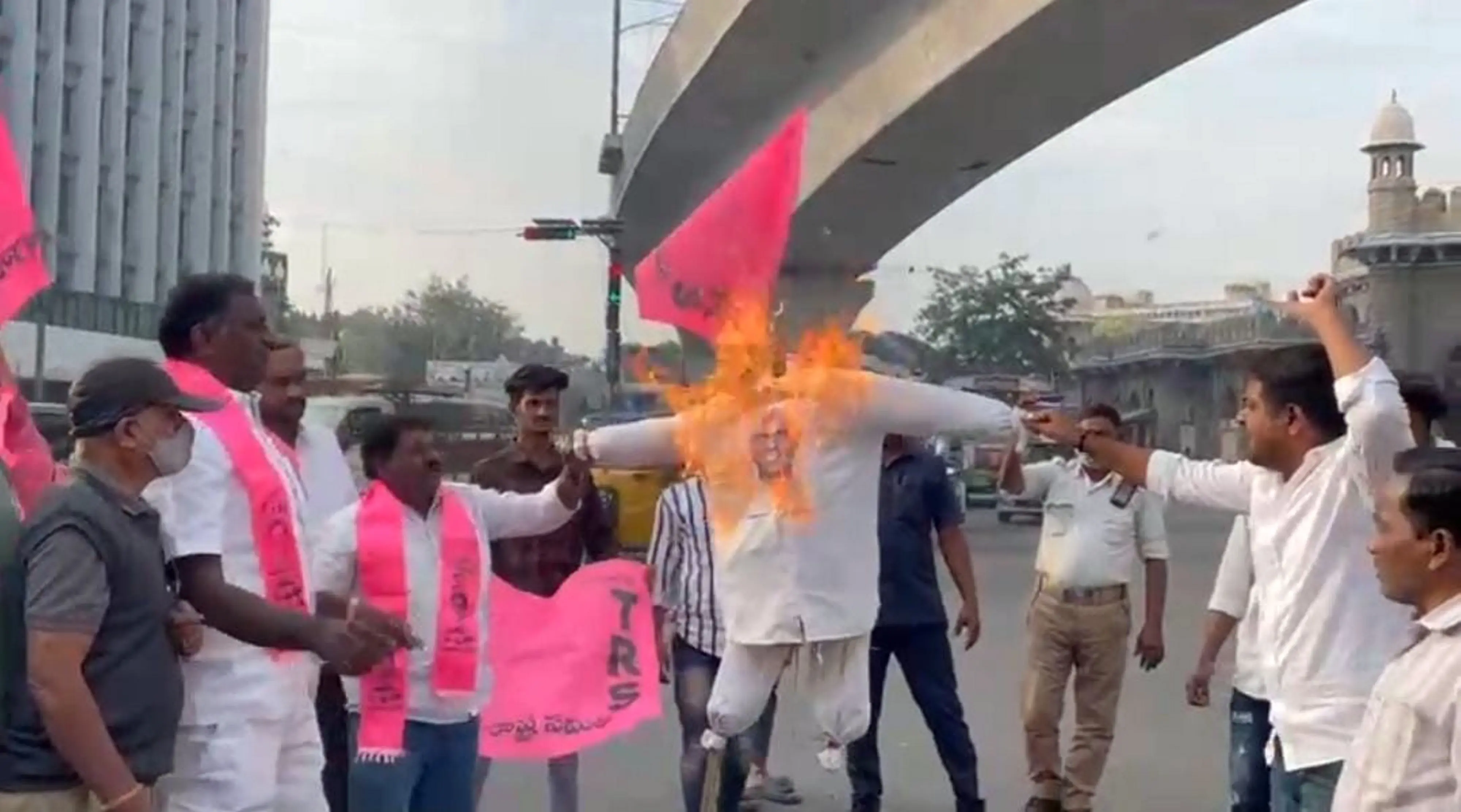 TRS workers stage a protest against BJP MP Arvind l Photo: PTI