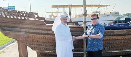 Hashim with Qatar Cultural Forum Manager
