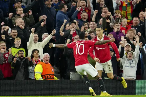Cristiano Ronaldo, right, celebrates with Marcus Rashford after scoring | AP