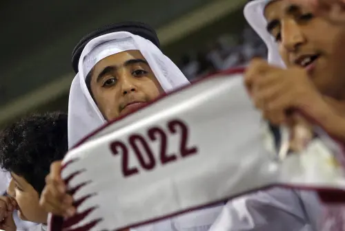Qatari football fan cheers for his team | AFP