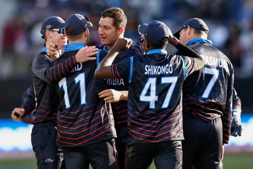 JJ Smit (C) and teammates celebrate the wicket of Chamika Karunaratne | AFP
