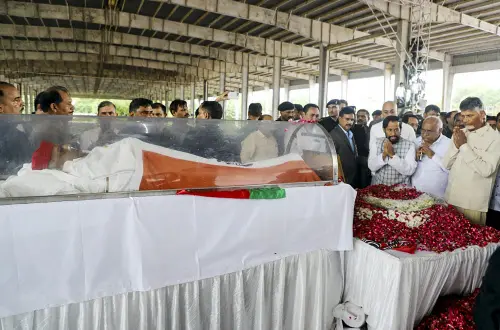 TDP chief N Chandrababu Naidu pays his last respects to Samajwadi Party founder Mulayam Singh Yadav, in Saifai, Tuesday | Photo: PTI