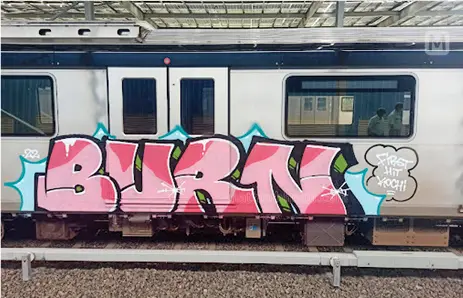 The spray-painted message on the train bogie / Photo: Mathrubhmi