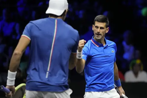 Djokovic makes stylish return at Laver Cup as Federer watches on