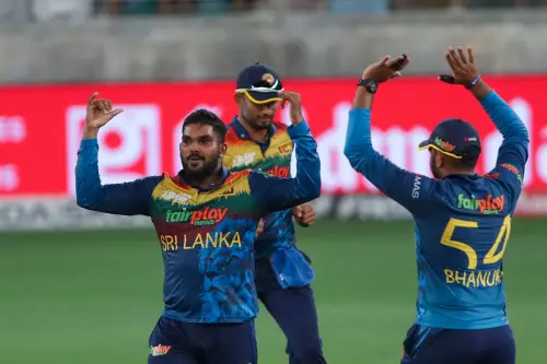Wanindu Hasaranga (L) celebrates after dismissing Pakistan's captain Babar Azam | AFP